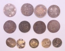 A small collection of early milled sixpences and early hammered silver coins.