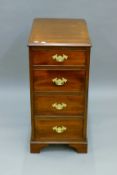An Edwardian mahogany bank of drawers. 37.5 cm wide.