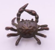 A Japanese bronze model of a crab. 5.5 cm wide.