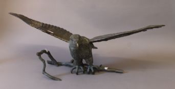 A large bronze model of an eagle. 95 cm wide.