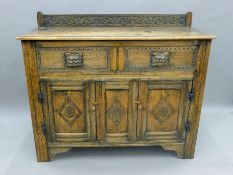 A 19th century carved oak sideboard. 136 cm wide.