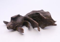 A bronze model of a fish. 9.5 cm long.
