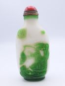 A Peking glass snuff bottle. 8.5 cm high.