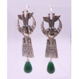 A pair of silver and jade Egyptian revival Art Deco style earrings. 7 c cm high.