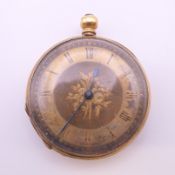 A small 19th century open faced unmarked gold (possibly 14/15 ct gold) pocket watch.