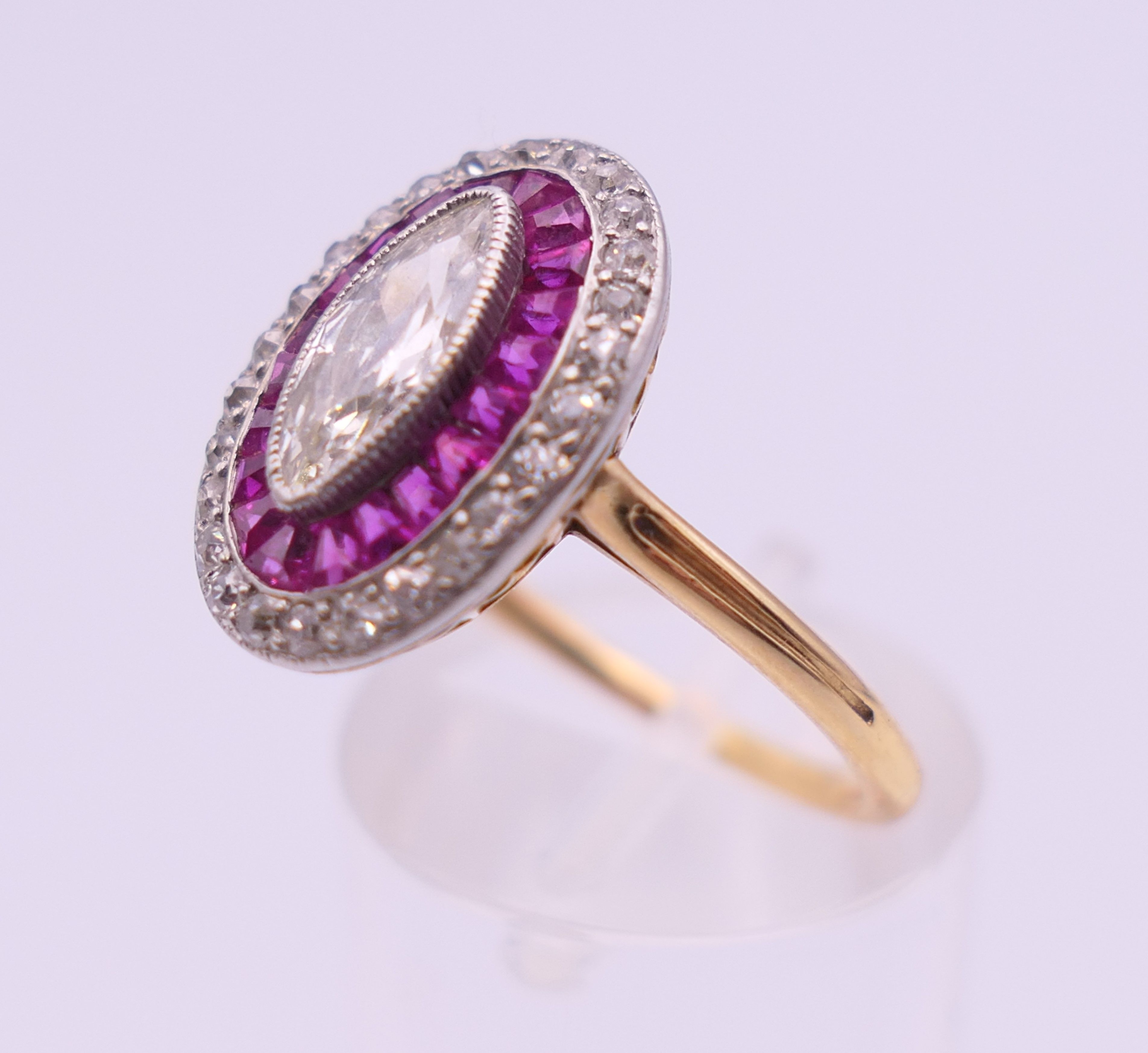 An unmarked 18 ct gold diamond and ruby ring, the central stone 9 mm high. Ring size O. 4. - Image 4 of 6