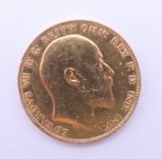 An Edward VII gold sovereign, dated 1903.