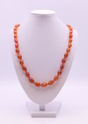 A bead necklace. 54 cm long.