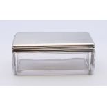 An early Victorian silver lidded glass vanity box, hallmarked London 1839. 9 cm long.