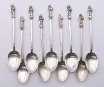 Nine silver Apostle teaspoons. Each 11.5 cm high. 126.8 grammes.