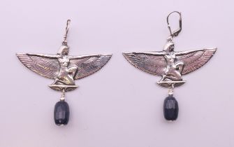 A pair of Egyptian Revival earrings. 5 cm wide.