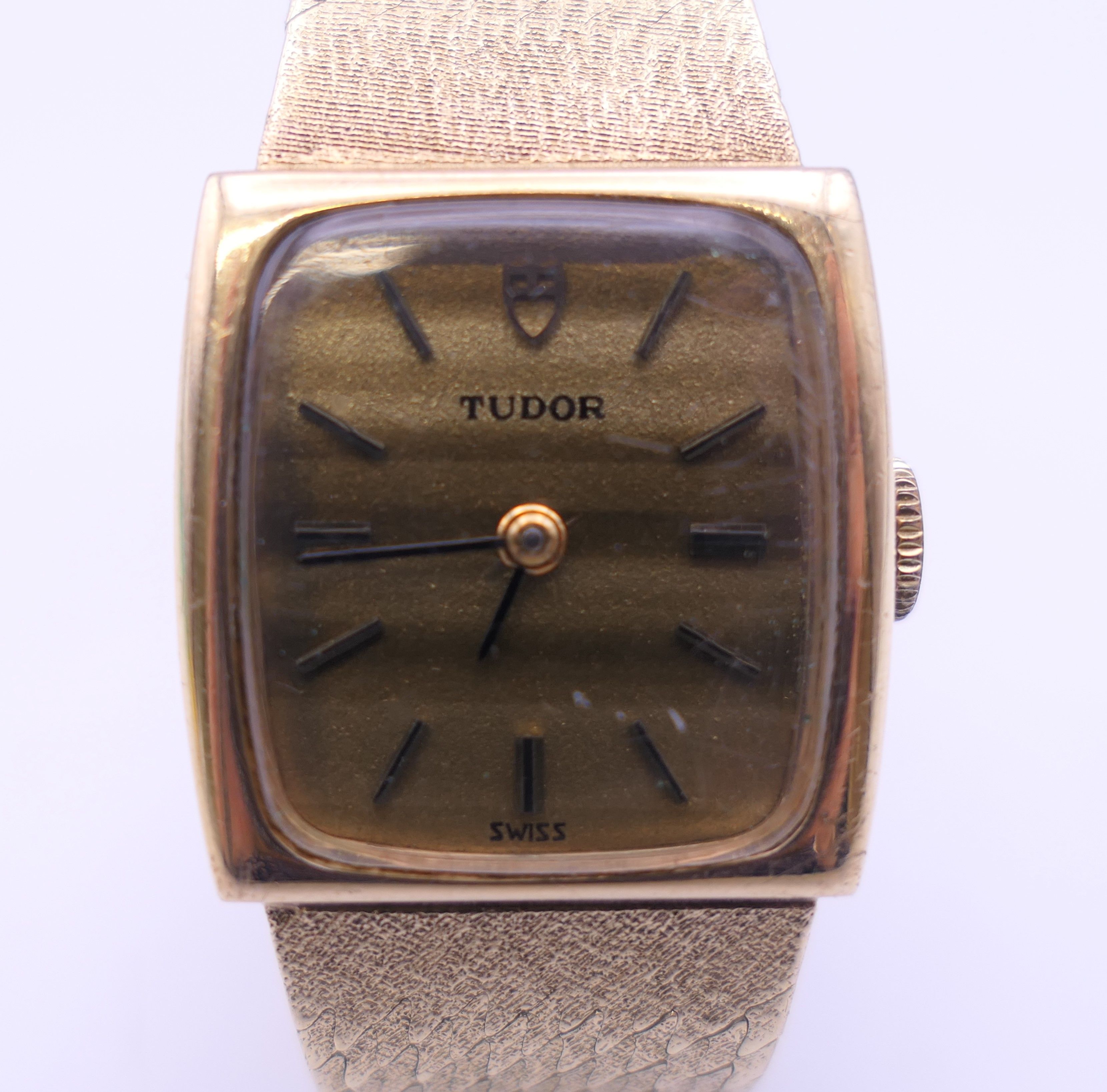 A 9 ct gold ladies Rolex Tudor wristwatch. 2 cm wide. 30.4 grammes total weight.