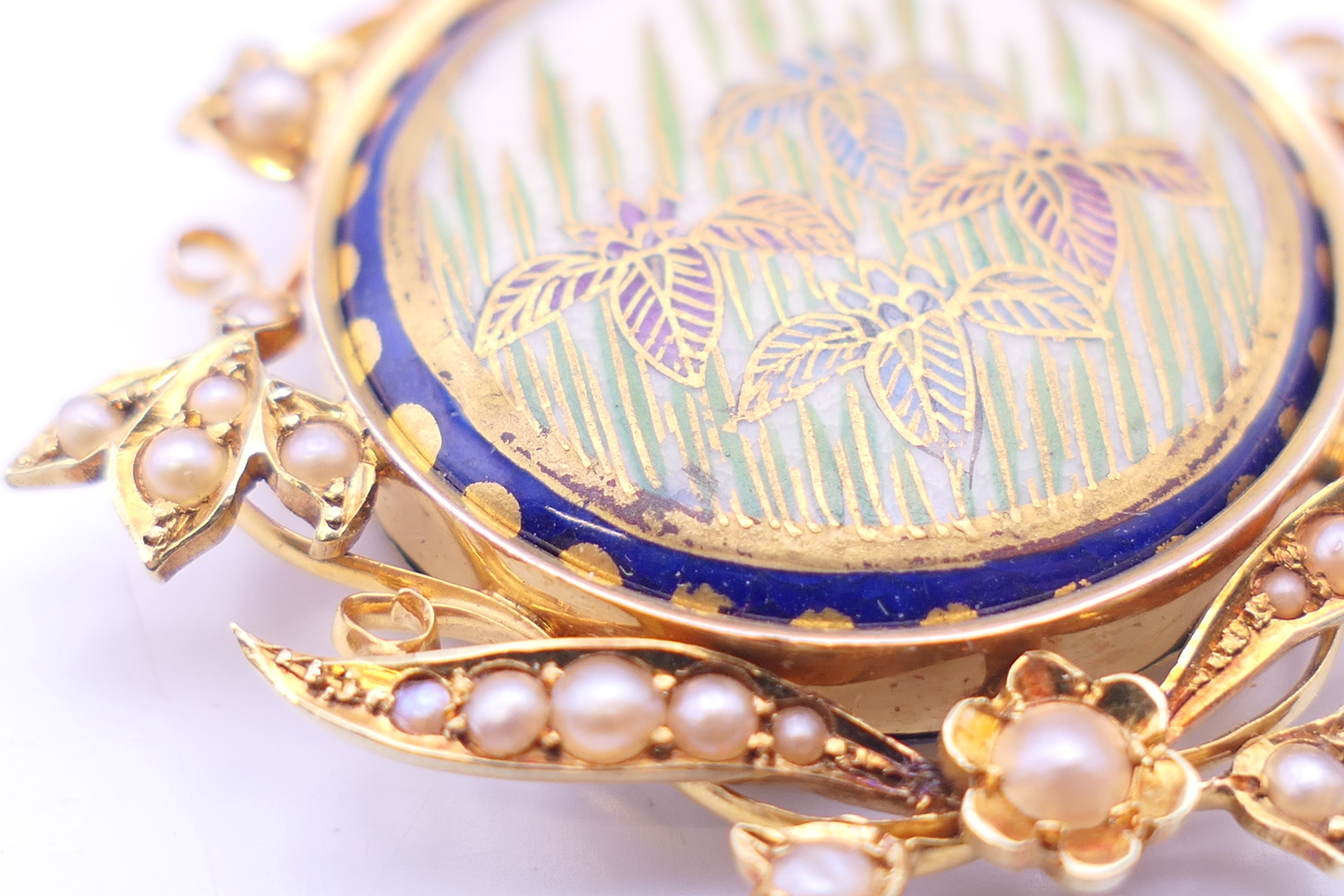 A gold and seed pearl pendant centred with a Satsuma porcelain plaque. 4 cm wide. - Image 5 of 13