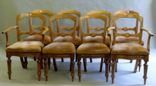 A set of eight Victorian mahogany dining chairs, including two carvers. The carvers 57.5 cm wide.