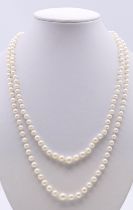 A two strand pearl necklace with a 9 ct gold clasp. 43 cm long.