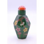 A Chinese green glass snuff bottle. 6.5 cm high.
