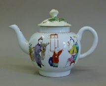 A Chinese porcelain teapot decorated with figures, with associated lid. 19 cm long.