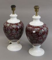A pair of porcelain lamps. 53 cm high.