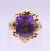 A 14 K gold amethyst ring. Ring size M. 5.7 grammes total weight.