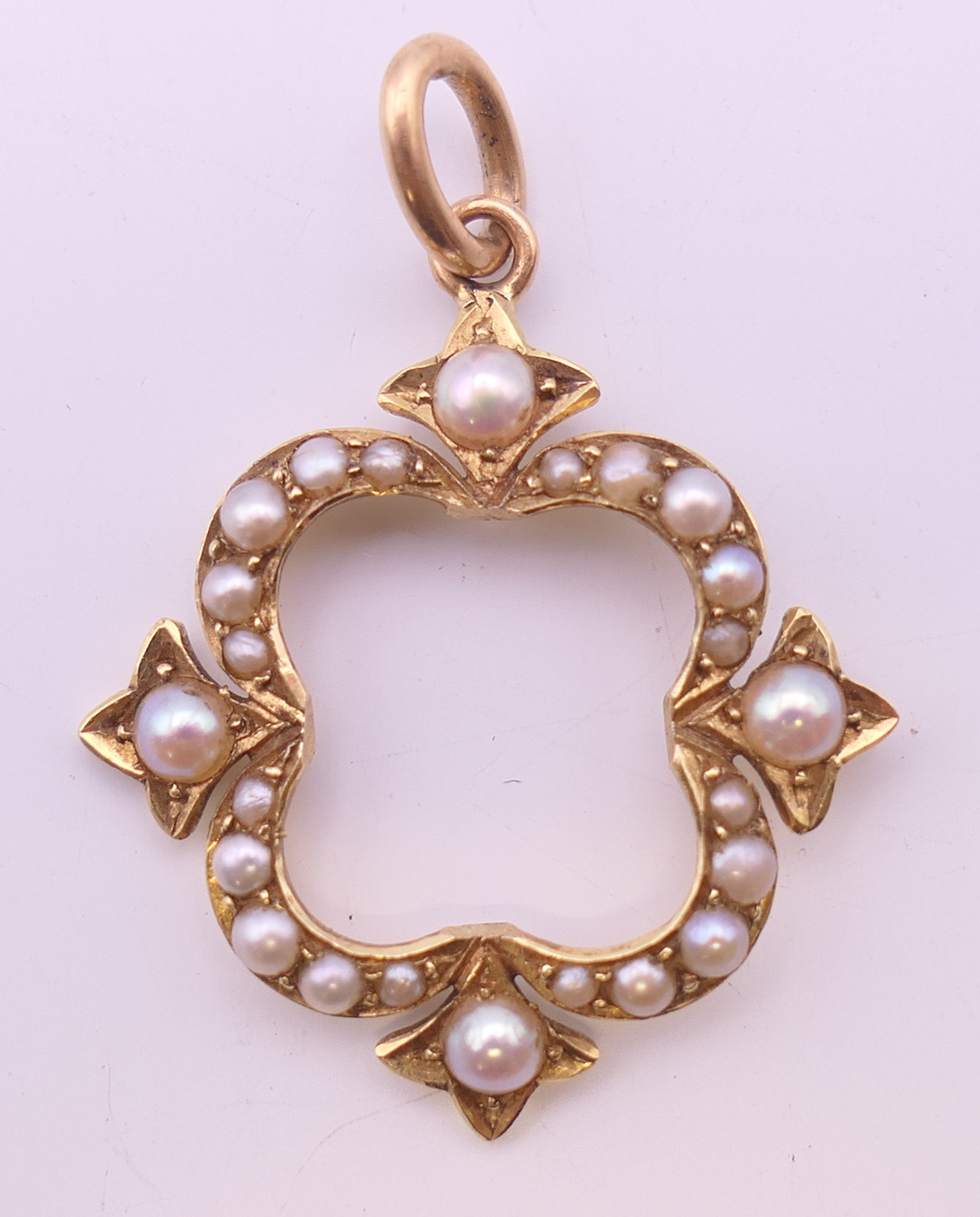 A Victorian 15 ct gold seed pearl pendant. 2.5 cm high. - Image 2 of 5