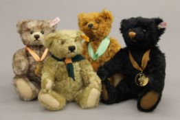 Four Steiff teddy bears, each housed in a Steiff display case - 2007 Bear of the Year,