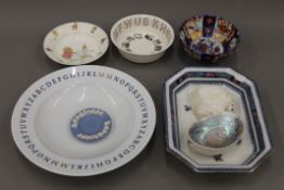 A small quantity of various ceramics and two abalone shells.