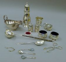A quantity of various silver and silver plate, including cruets, toddy ladles, etc. 338.