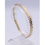 A small 9 ct gold bracelet. 18 cm long. 6 grammes.