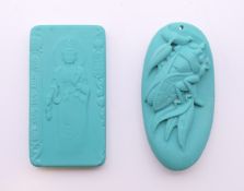 Two turquoise coloured pendants. The largest 6.5 cm long.