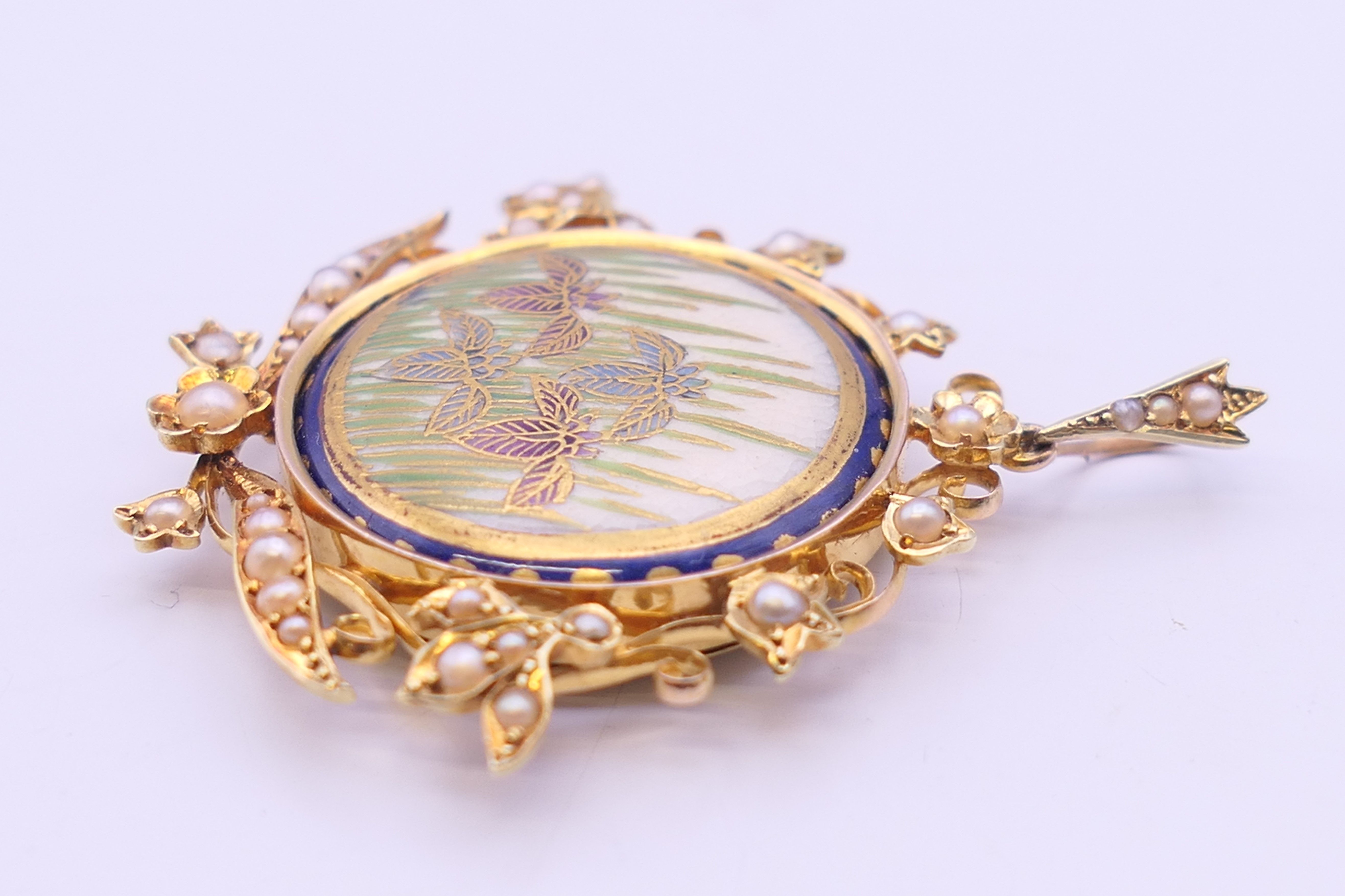 A gold and seed pearl pendant centred with a Satsuma porcelain plaque. 4 cm wide. - Image 13 of 13