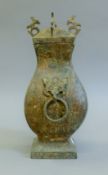 An archaic style bronze vessel. 28.5 cm high.