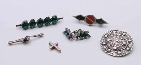 A Scottish stone brooch, silver earrings, two silver bar brooches,