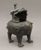 A 19th century Chinese bronze censer formed as a dog of fo. 26 cm high.