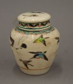 A small Japanese pottery ginger jar, signed. 9.5 cm high.