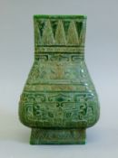 A Chinese archaic style jade vase. 21 cm high.