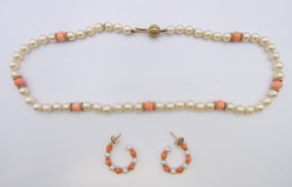 A coral and seed pearl necklace with a 15 ct gold clasp, with matching earrings.