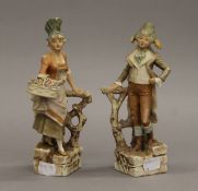 A pair of 19th century Continental porcelain figures. The largest 20.5 cm high.