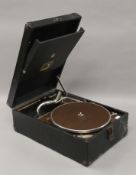 A black HMV gramophone, in working order. 41 cm long.