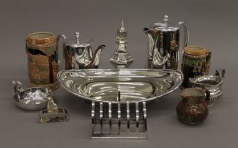 A quantity of silver plate and two tankards.