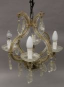 A Venetian glass chandelier. Approximately 45 cm high.