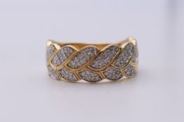 A silver gilt leaf ring. Ring size R/S.