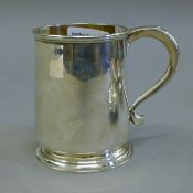 A silver tankard. 10 cm high. 212.5 grammes.