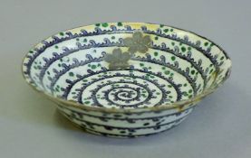 An 18th century Japanese porcelain bowl. 15 cm diameter.