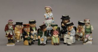 A quantity of various porcelain figures, small Dickens Toby jugs, etc. The largest 14 cm high.