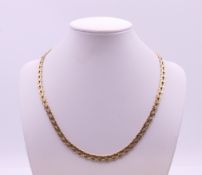 A 9 ct gold chain. 42 cm long. 24.5 grammes.