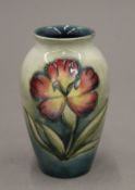 A small Moorcroft vase. 10 cm high.