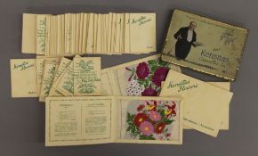 A collection of Kensitas silk cigarette cards.