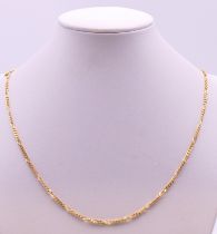 A 9 ct gold chain. 50 cm long. 7.3 grammes.