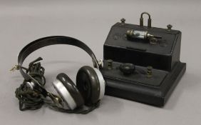 A BBC Brownie No2 Crystal Radio set and headphones.