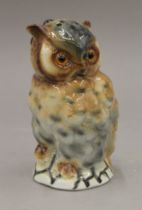 An early 20th century owl form night lamp. 16 cm high.